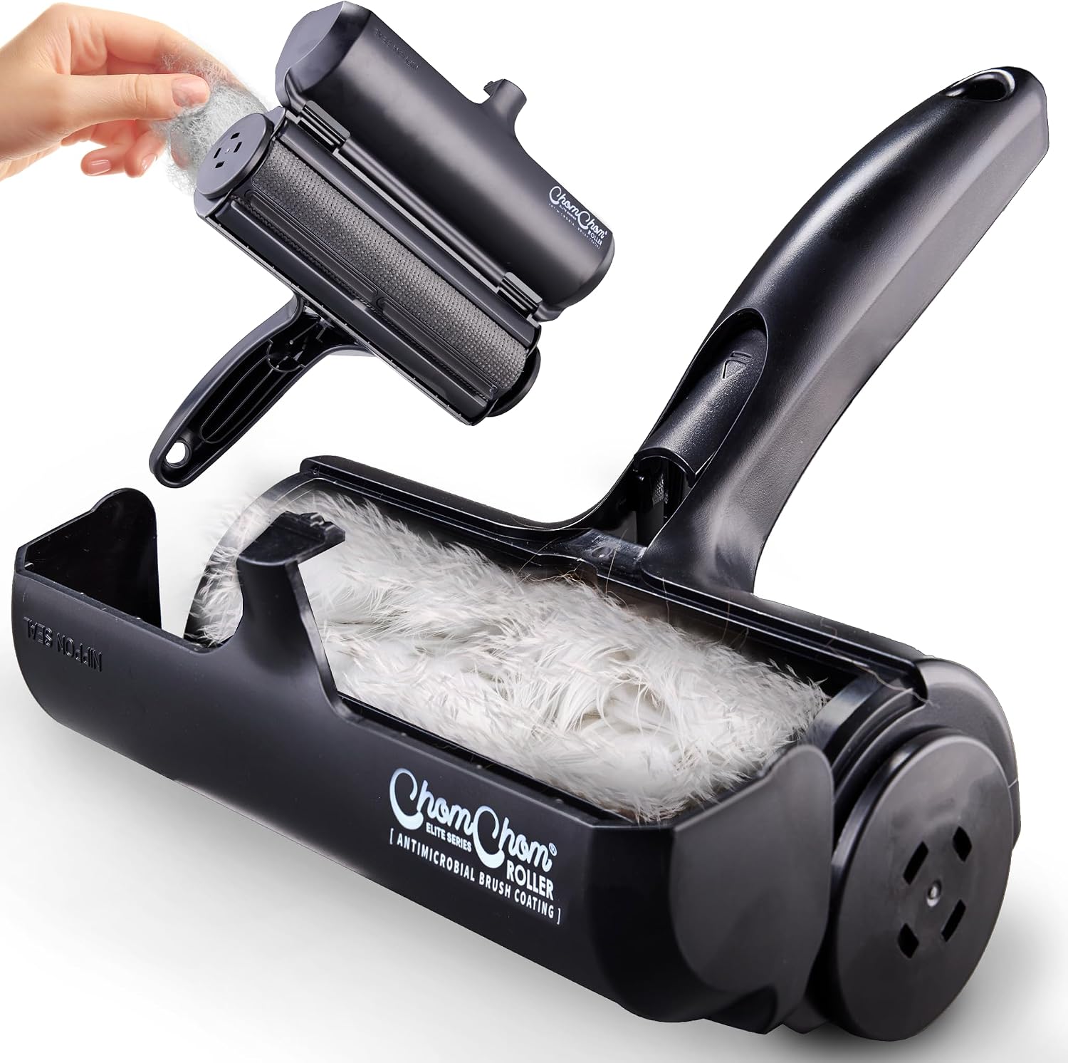 Black ChomChom Roller with pet hair in the waste compartment and the nylon catch pad lifted out, from the Amazon listing