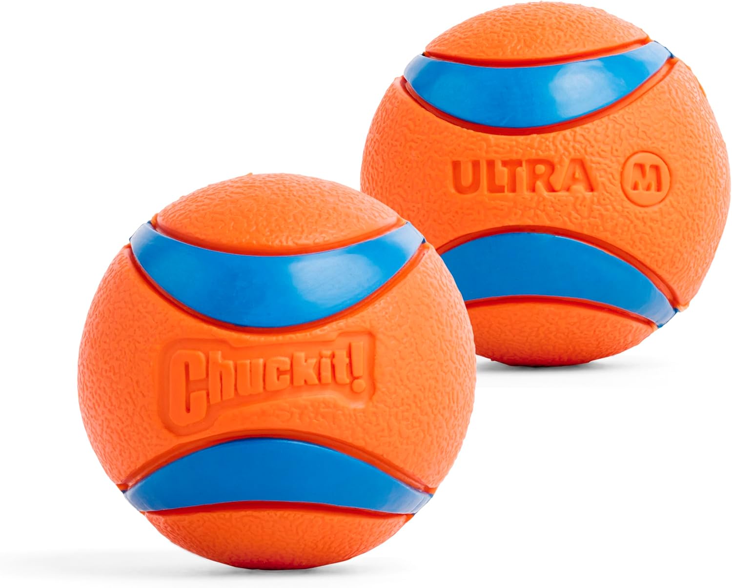 Close-up of two Chuckit! Ultra balls, one embossed Chuckit! and one marked ULTRA M